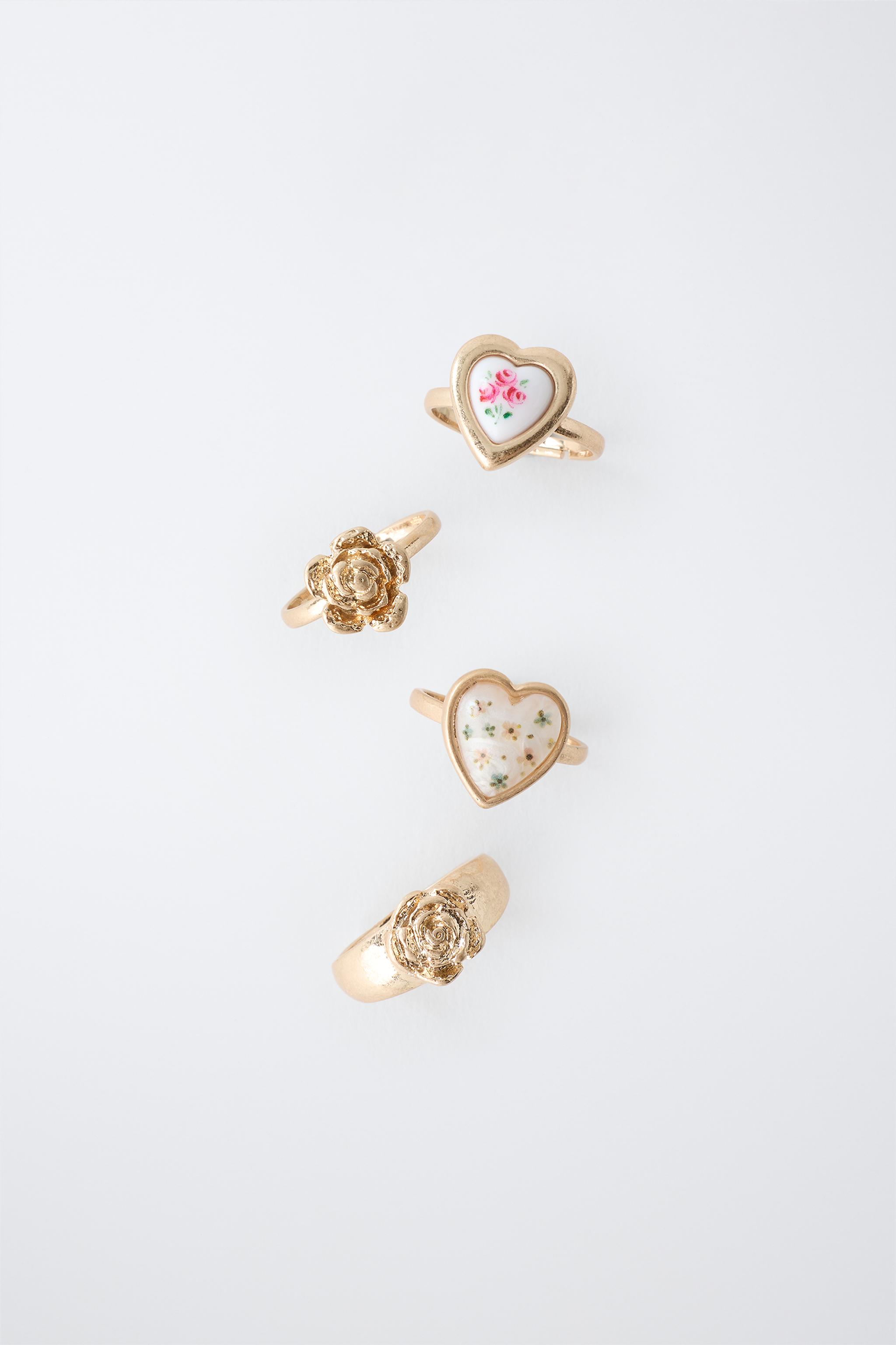 FOUR-PACK OF FLOWER AND HEART RINGS